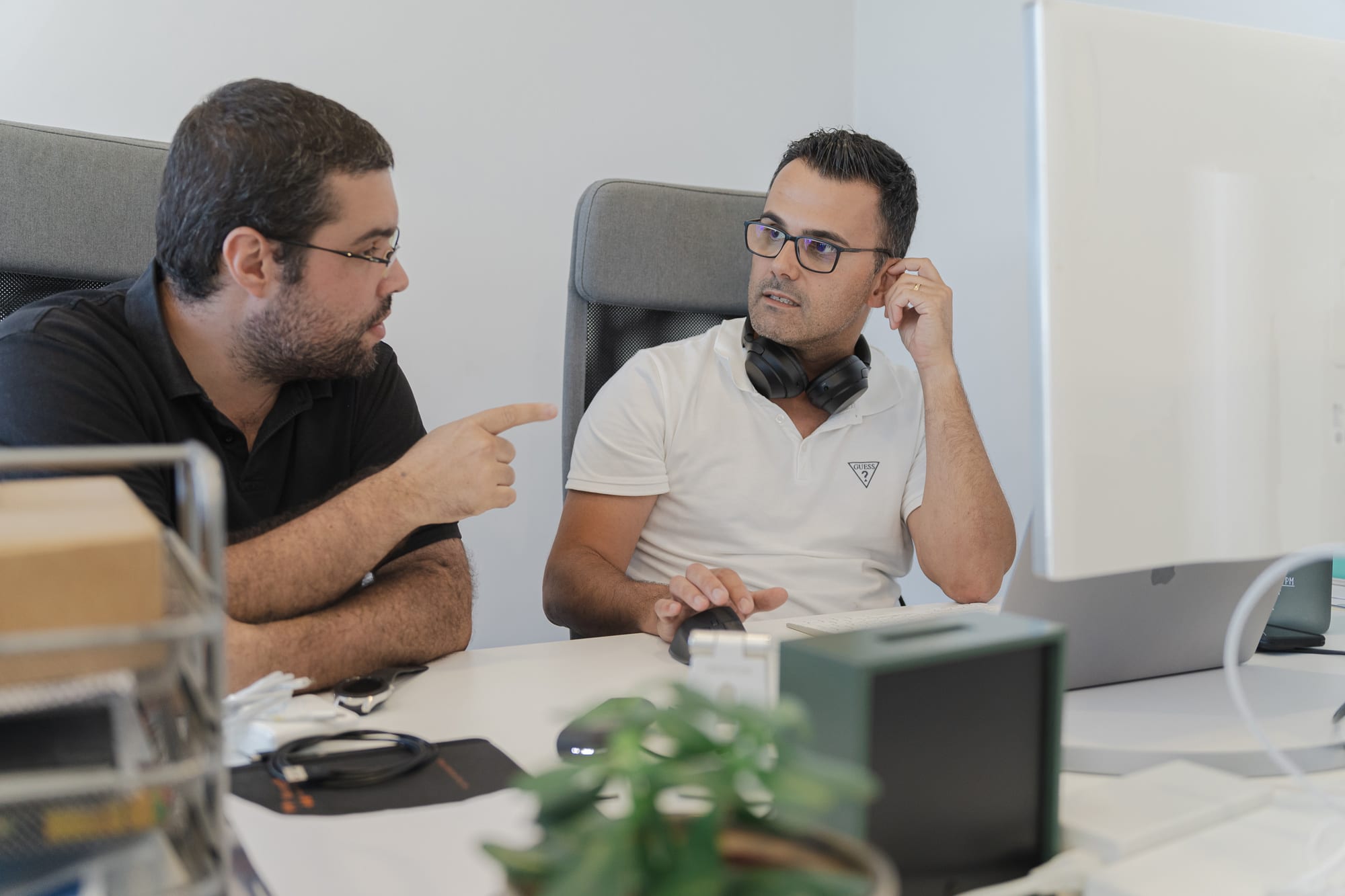 Nearsoft team members collaborating in the office